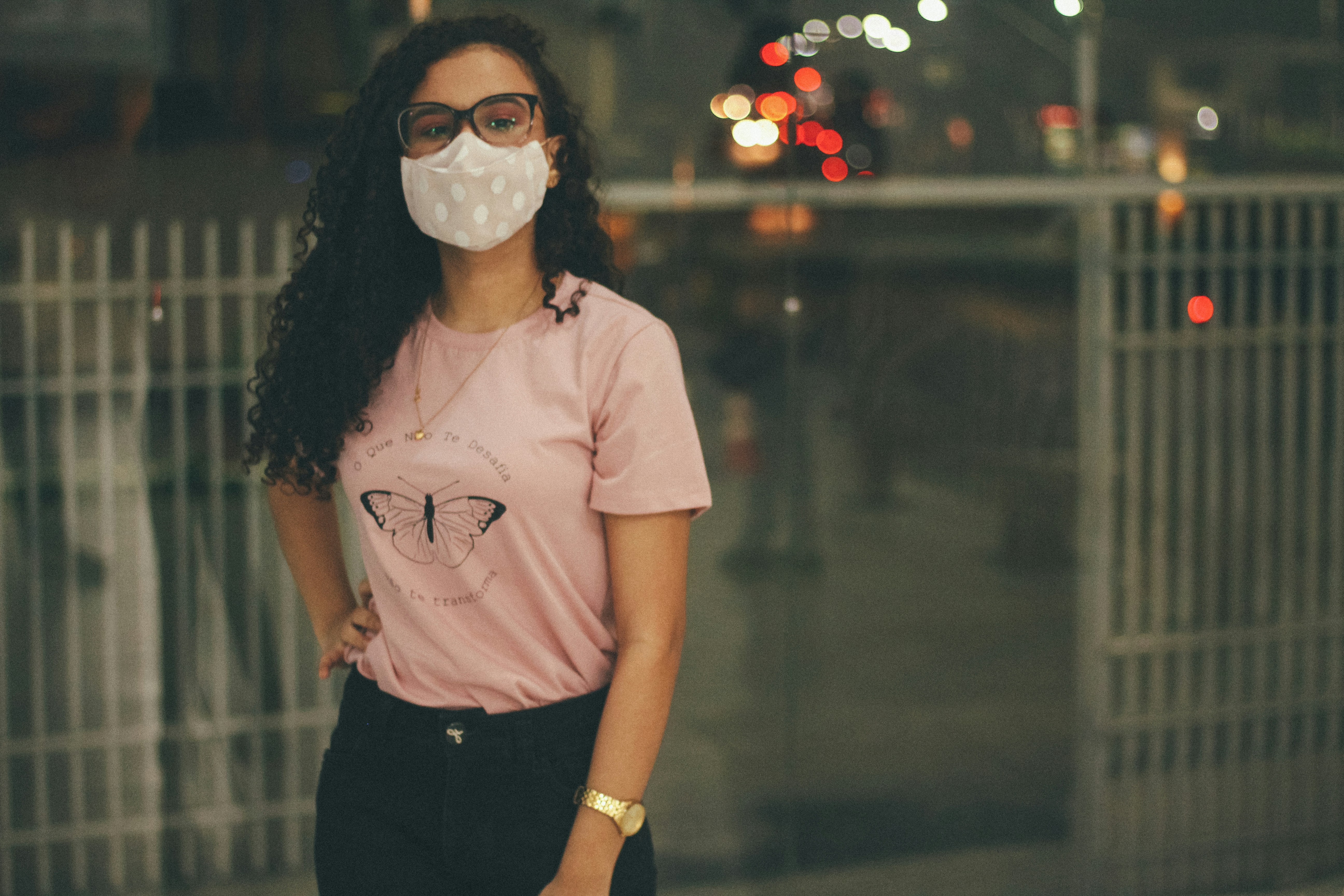 woman in white crew neck t-shirt wearing white face mask
