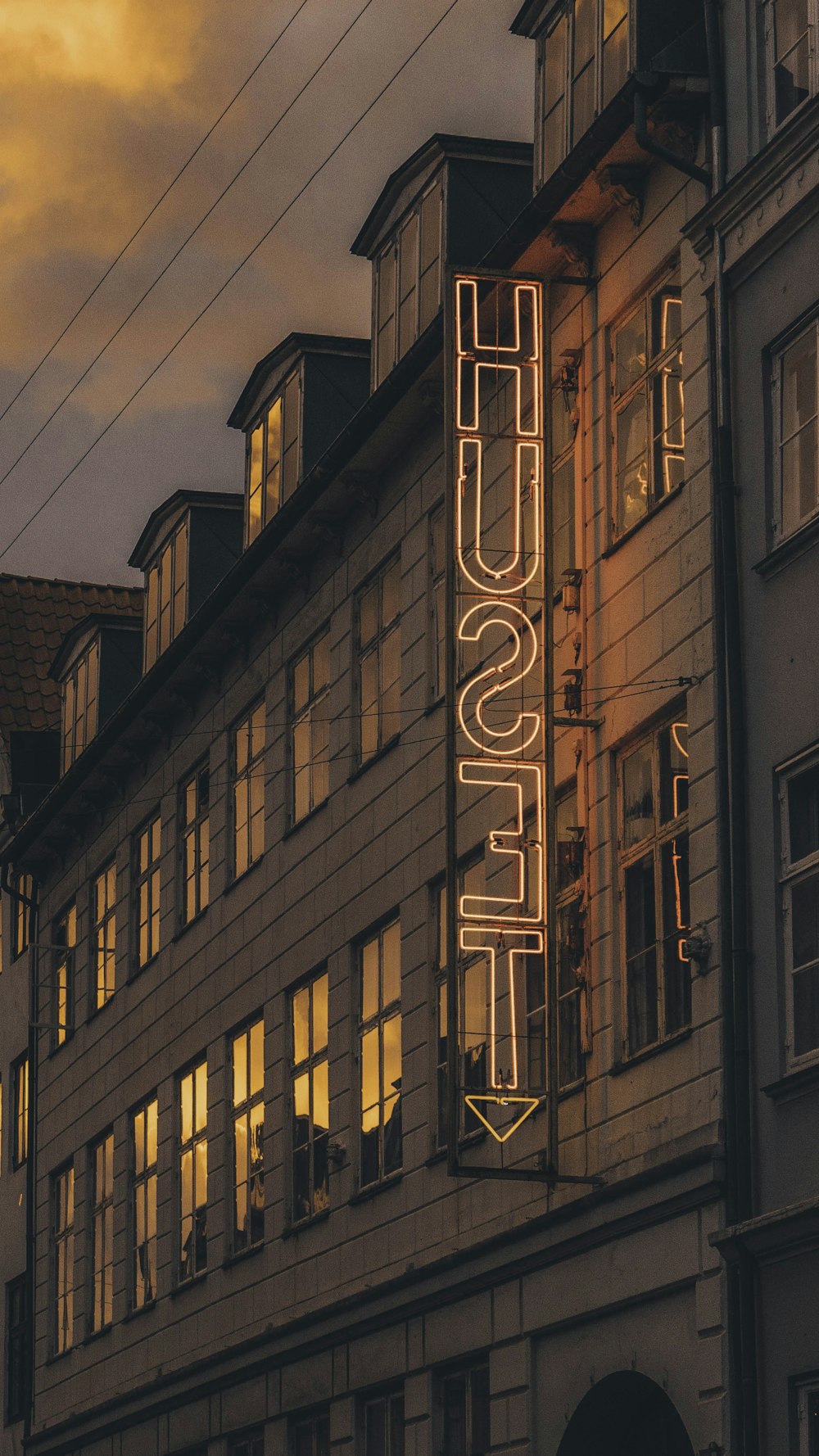 brown concrete building with white led light