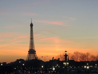 Original painting of a Paris street scene at sunset.