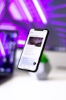 black smartphone on white table