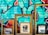 Three ornate picture frames are positioned against a vibrant graffitied wall. Within the frames, there is a painting depicting an outdoor scene, a black and white photograph of a person, and a reflective mirror. The graffiti features abstract shapes and bold colors.