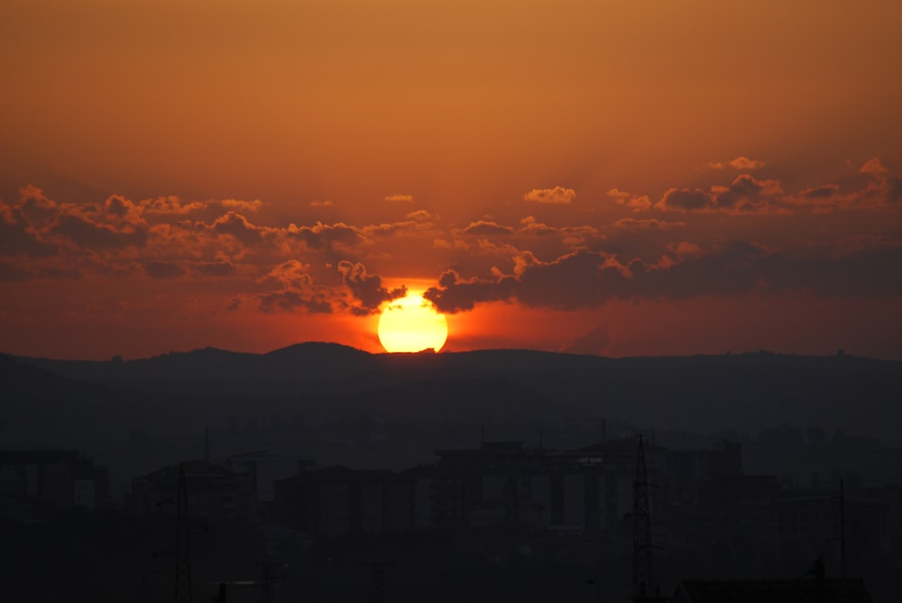 silhouette of mountain during sunset