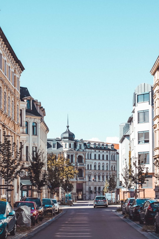 brown and white concrete buildings during daytime in Halle Germany