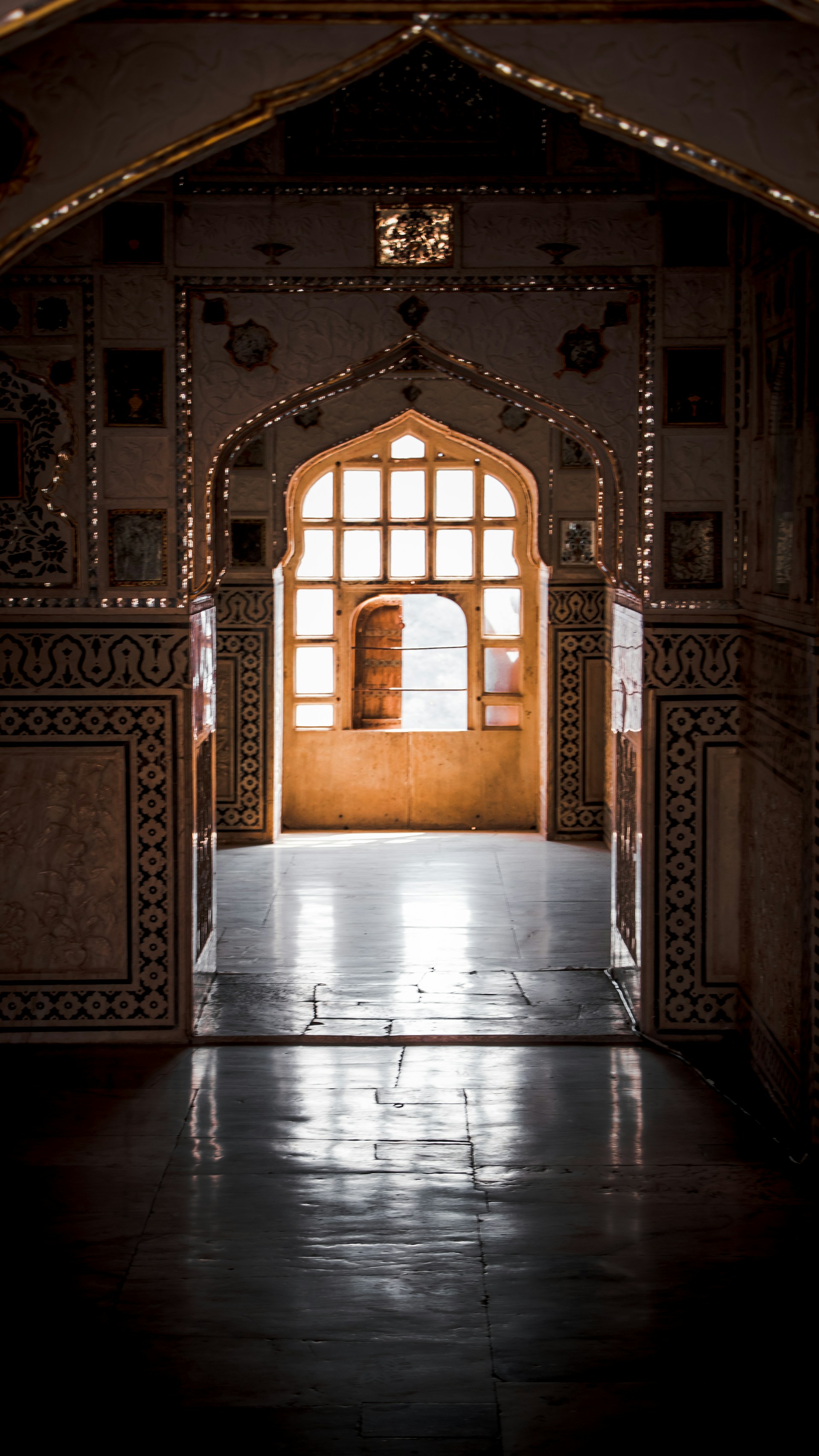 woman wearing yellow long-sleeved dress under white clouds and blue sky during daytime