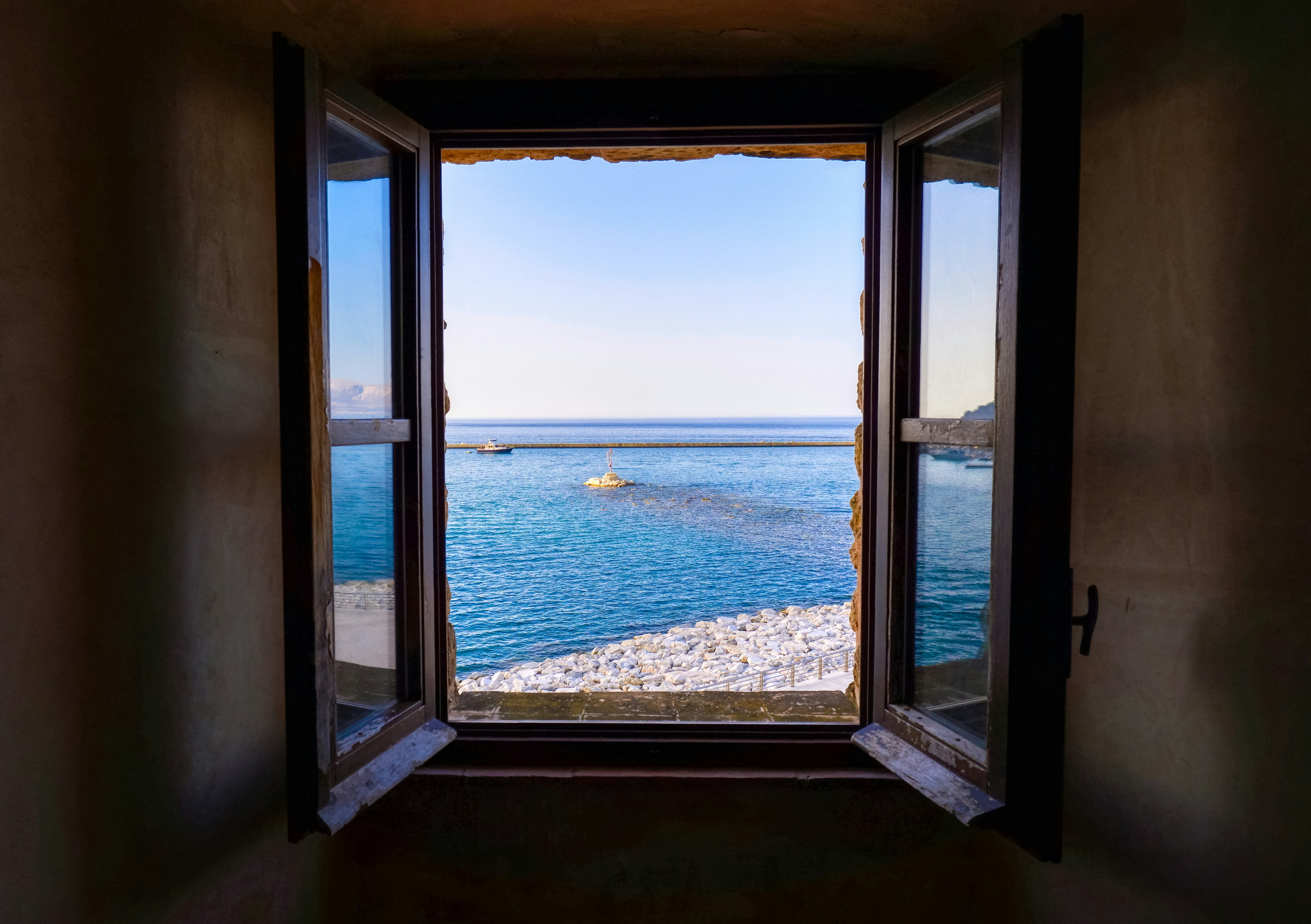 blue sea under blue sky during daytime