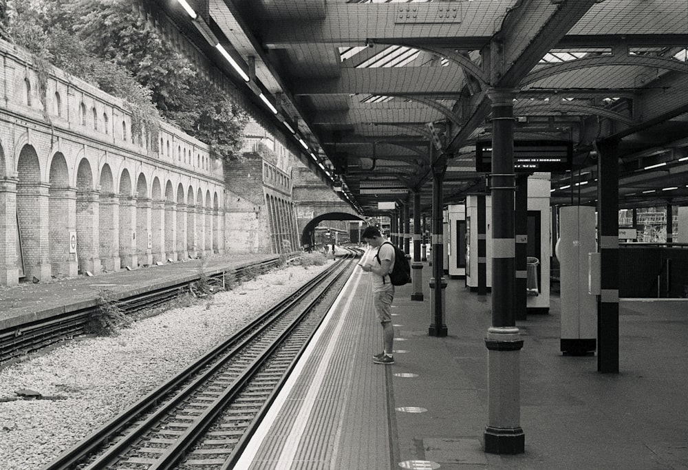 grayscale photo of train station