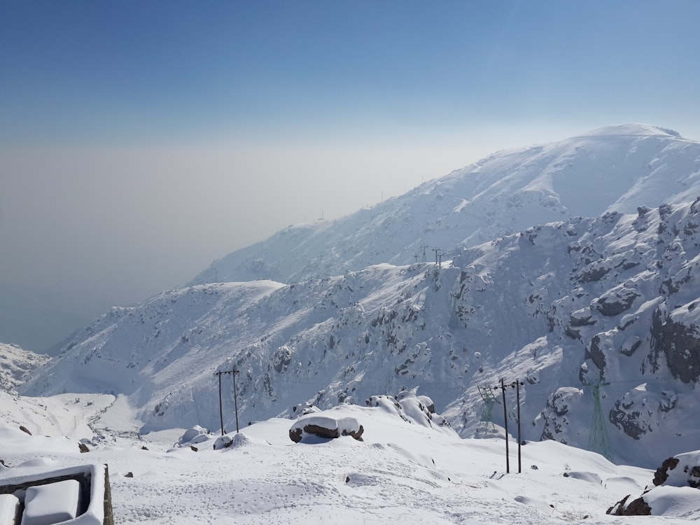 snow covered mountain during daytime