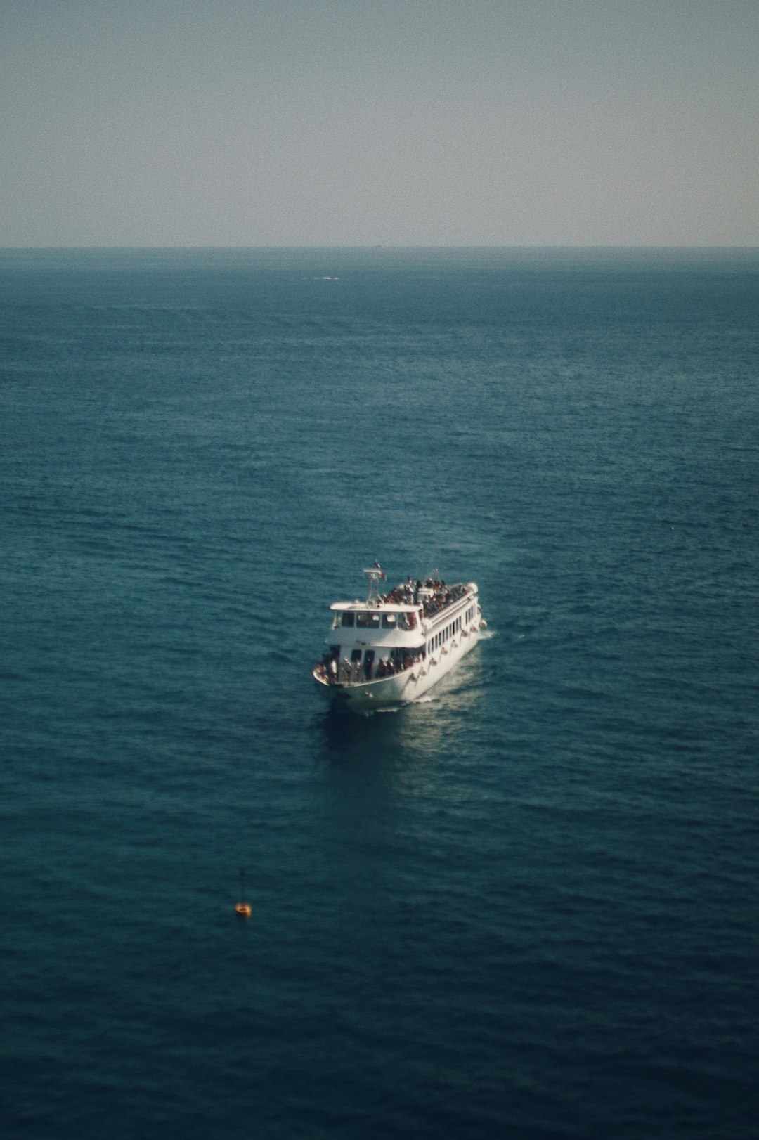 white ship on blue sea during daytime