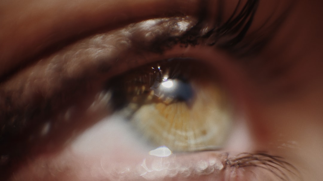 persons eye in close up photography