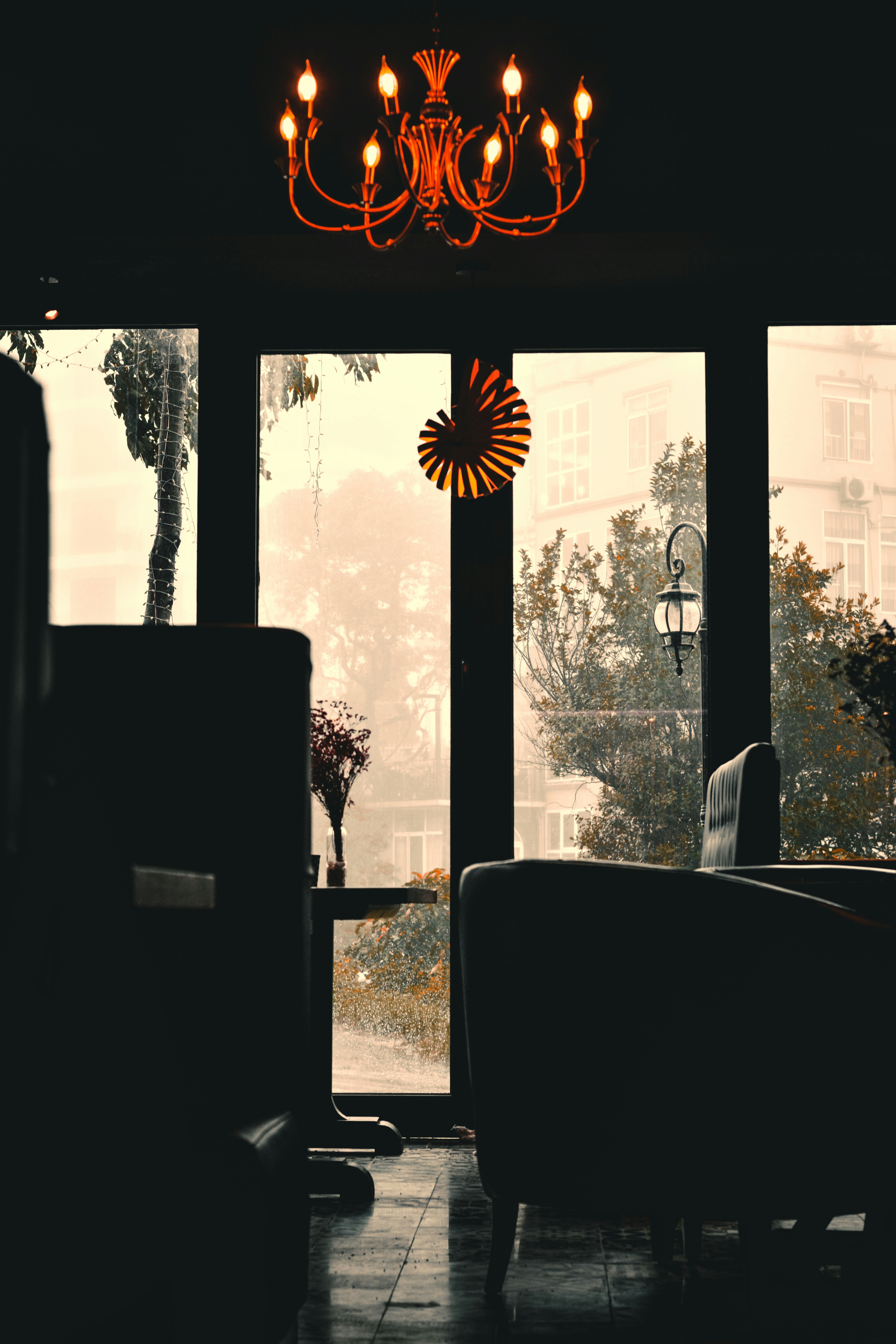 Black and white zebra print chair near glass window photo Free Beige