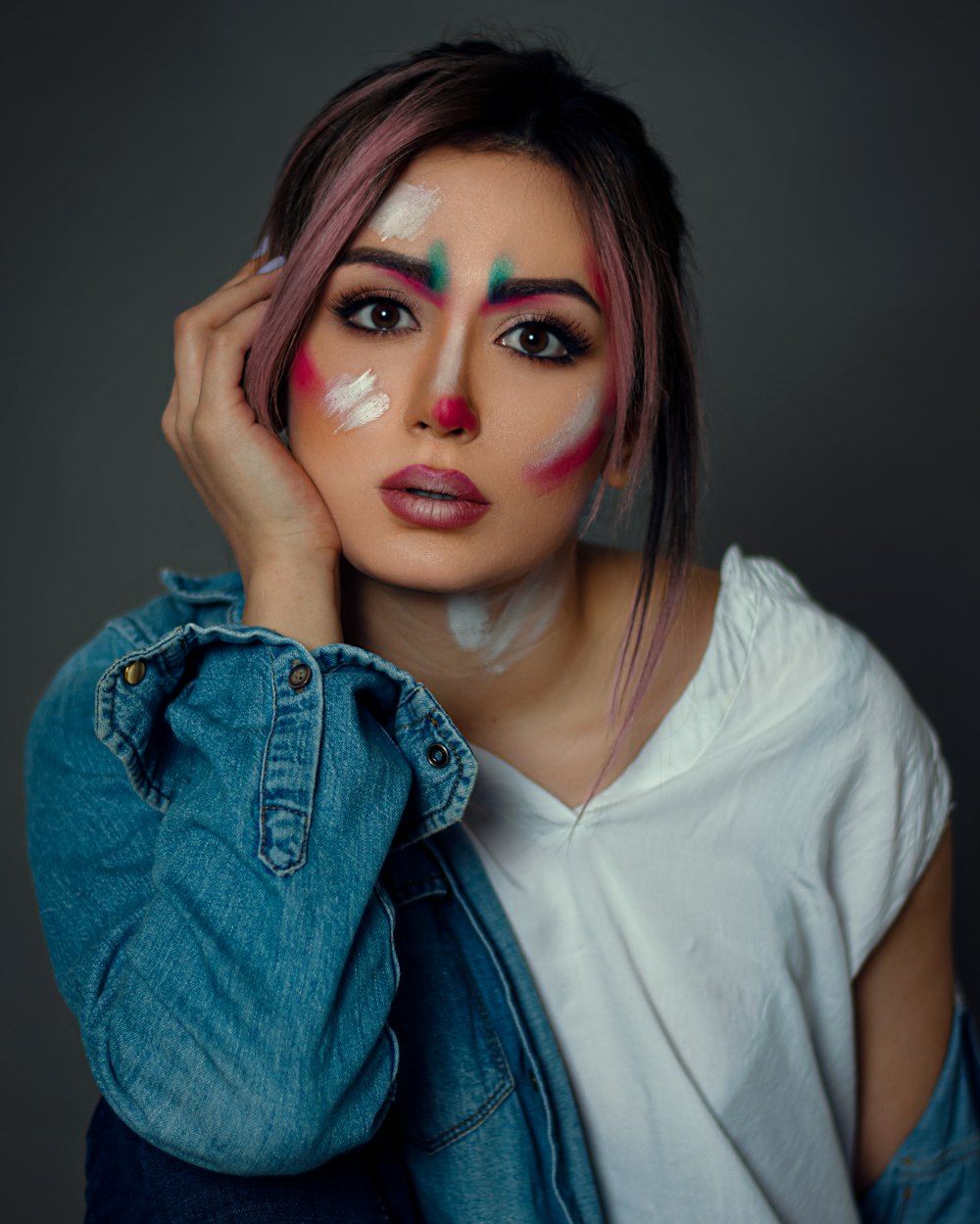 woman in white shirt and blue denim jacket