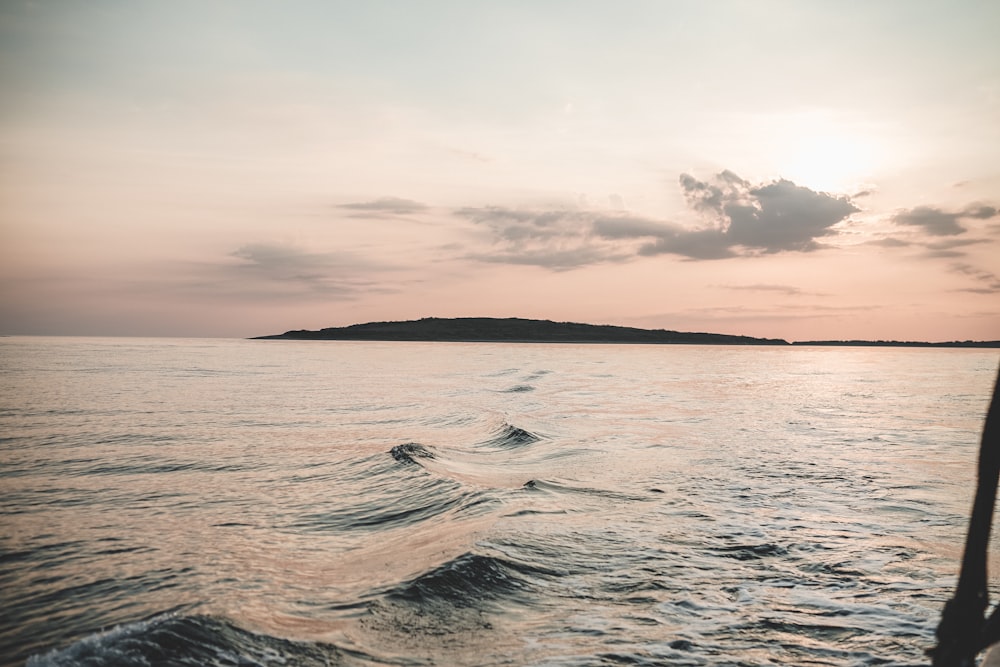 person surfing on sea during daytime