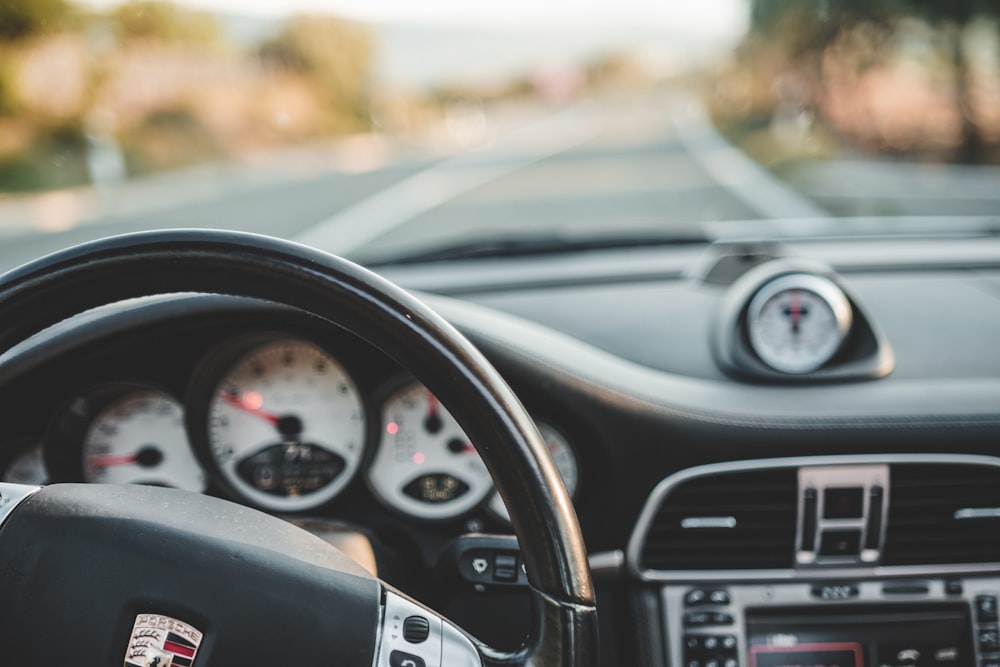 black and silver car steering wheel