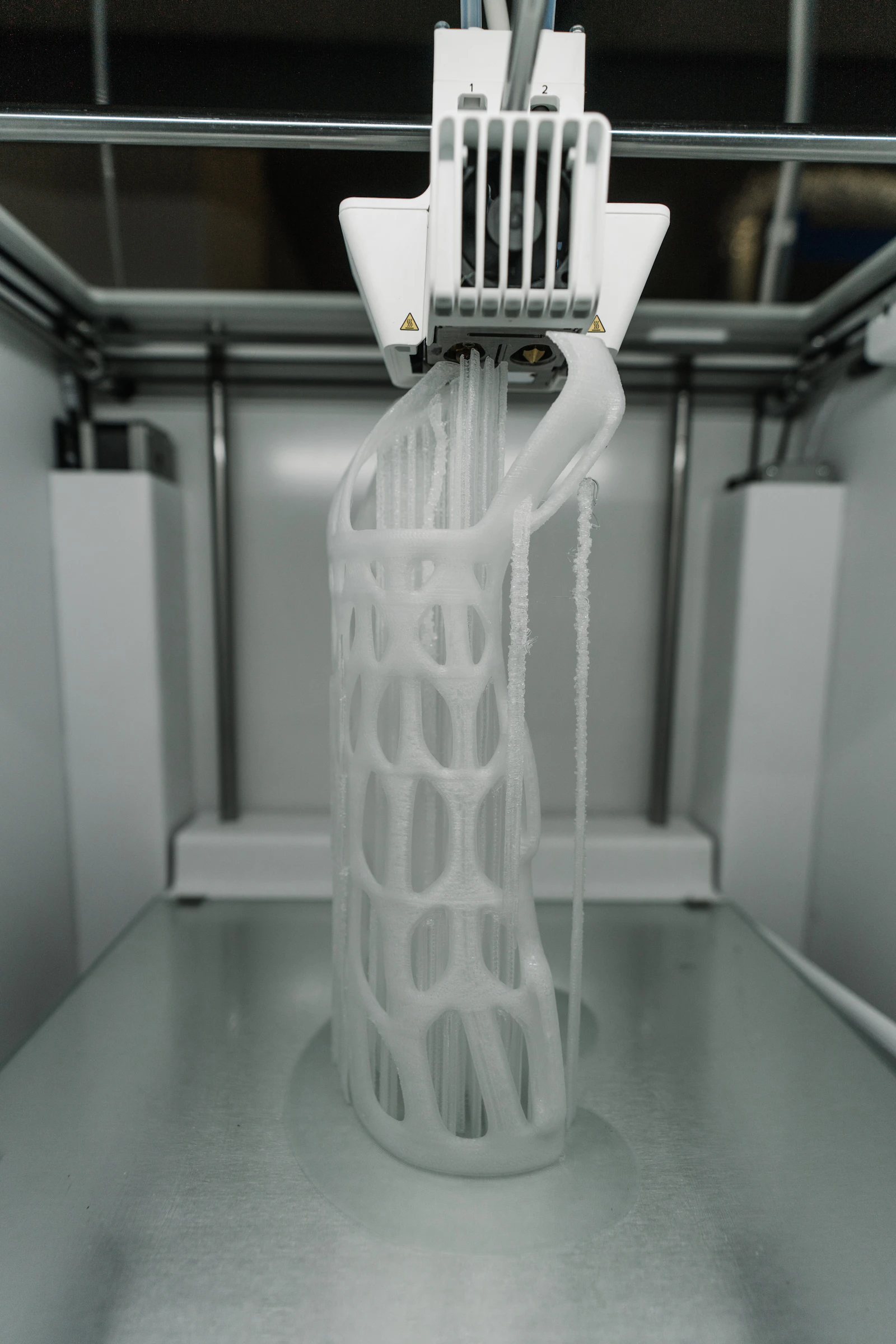 Small resin-printed accessory piece with a smooth finish