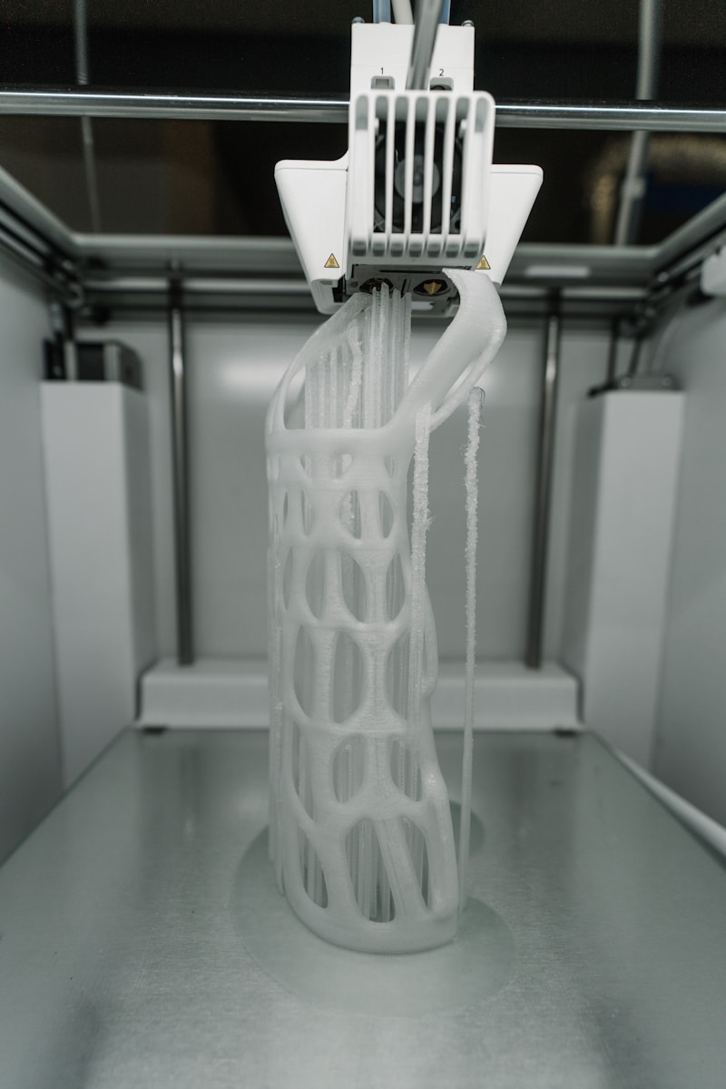 A 3D printer in action producing a detailed model
