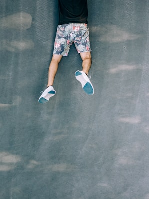 person in blue and white sneakers
