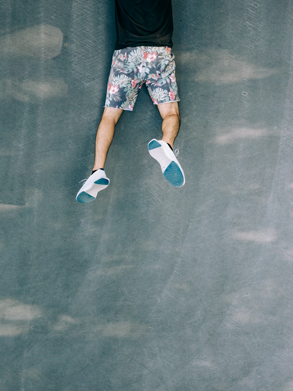 person in blue and white sneakers