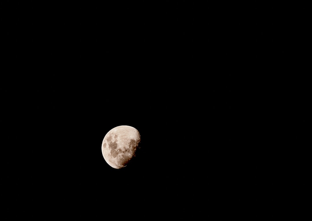 full moon in dark night sky