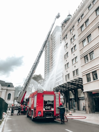 Technicians installing advanced fire protection systems on a commercial building.