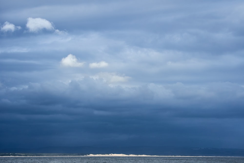 white clouds over the sea