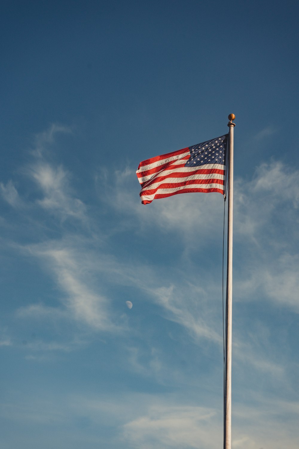 us flag under blue sky