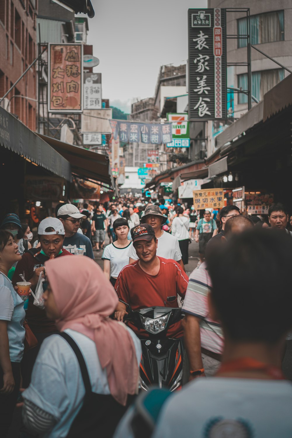 people in white shirts and black pants standing on street during daytime