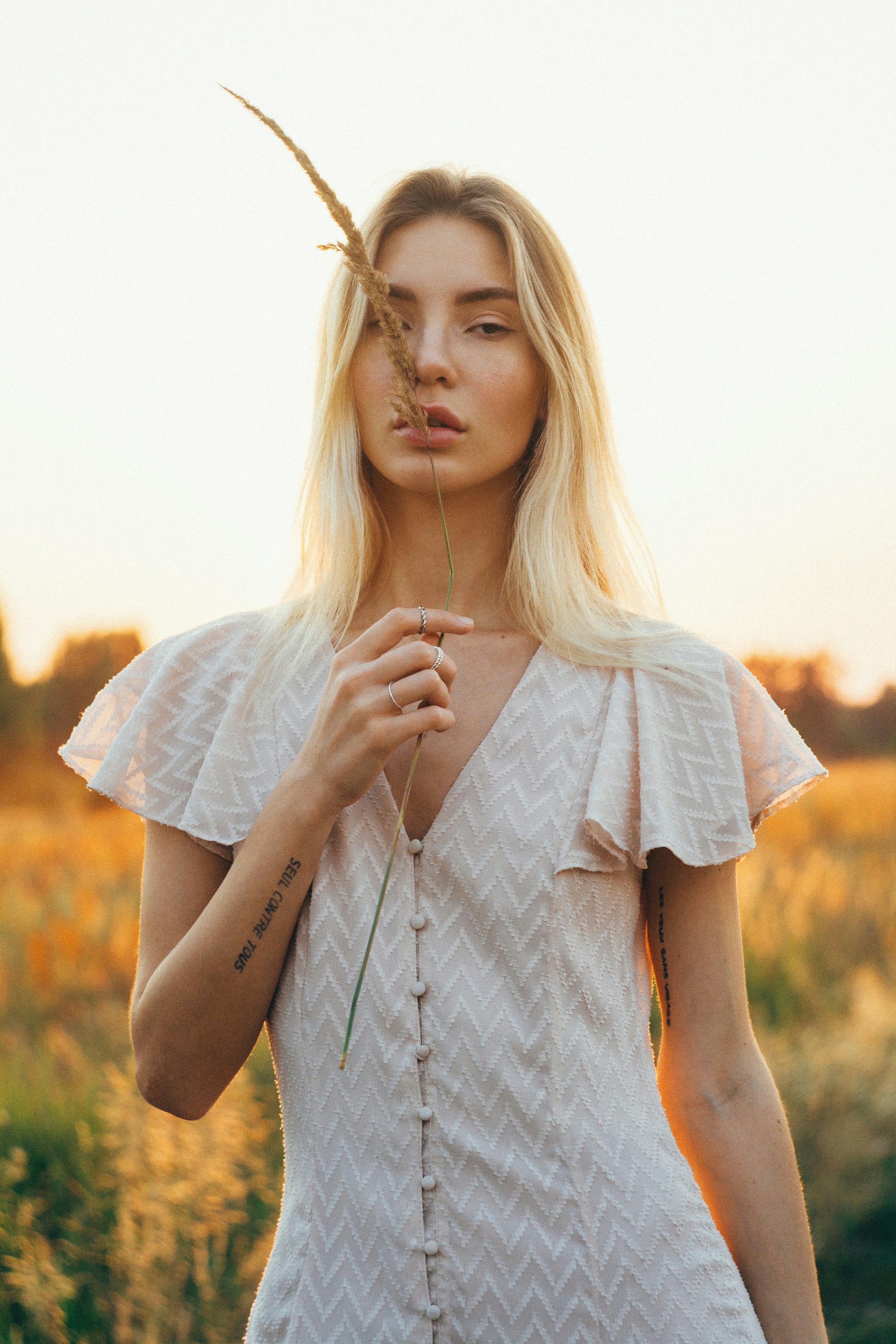woman in white and blue stripe shirt