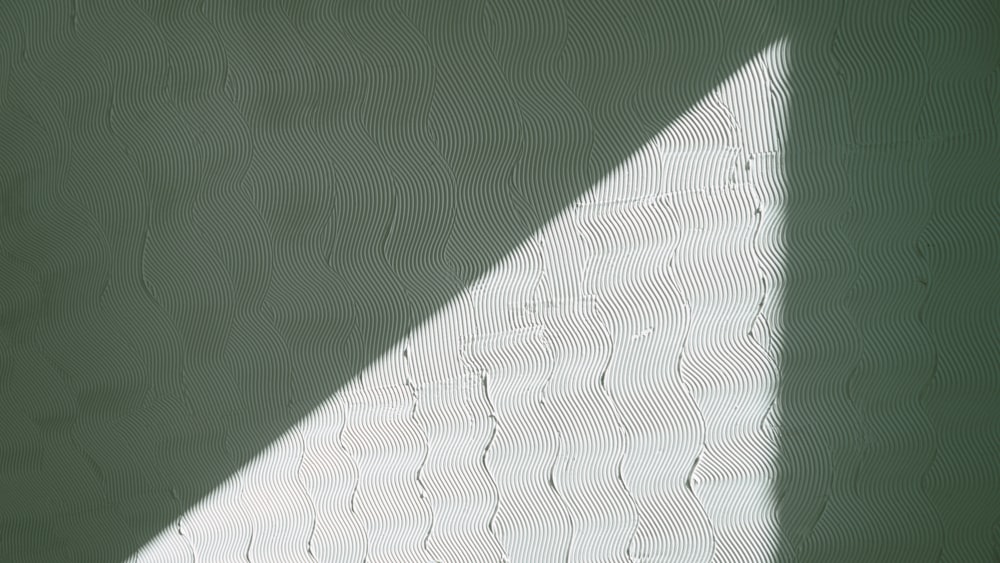 white textile on green textile