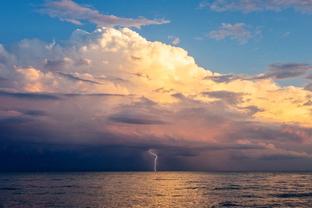 ocean under cloudy sky during daytime