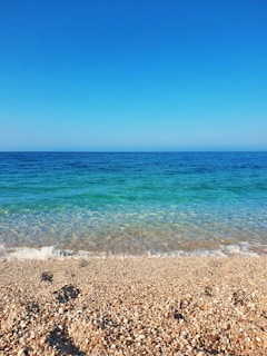 blue sea under blue sky during daytime