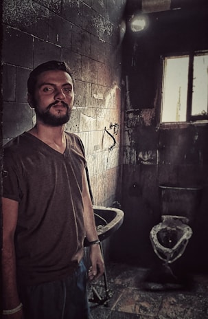 Emergency sewer backup cleanup in progress inside a residential bathroom.