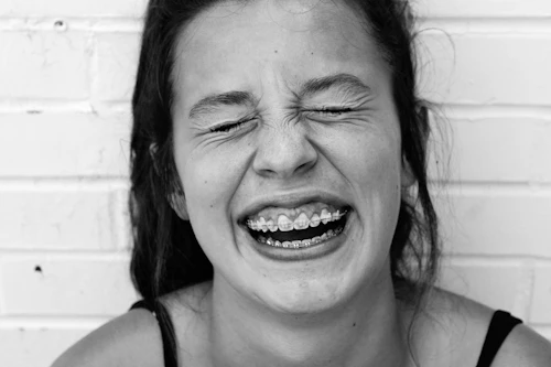 Smiling patient after same-day tooth repair in Orlando