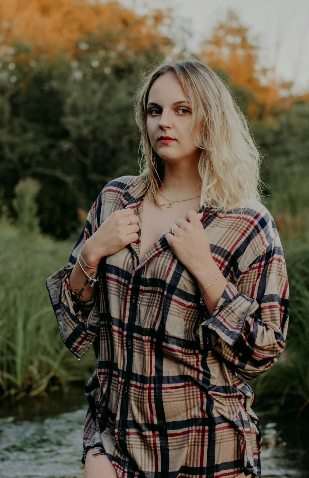 woman in black and white plaid long sleeve shirt