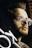 Profile avatar of a man with cyberpunk-style glasses and purple neon reflections