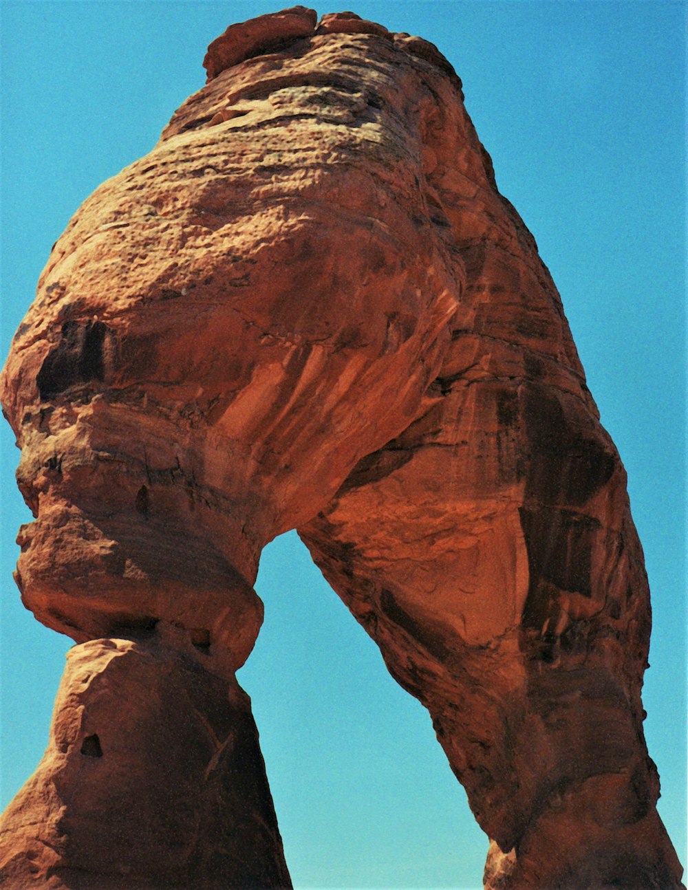 brown rock formation under blue sky during daytime