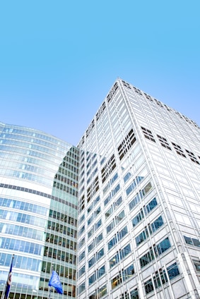 white concrete building under blue sky during daytime