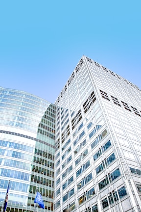 white concrete building under blue sky during daytime