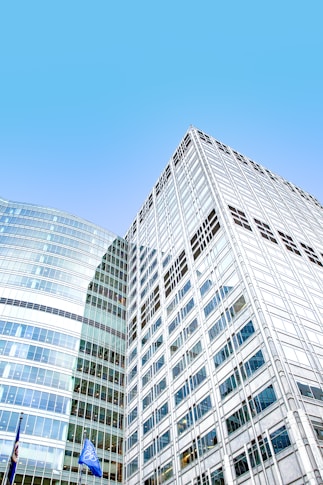 white concrete building under blue sky during daytime