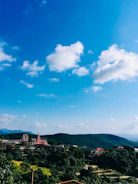 A scenic view of DTCP approved plots near Madurai's temple with clear boundaries.