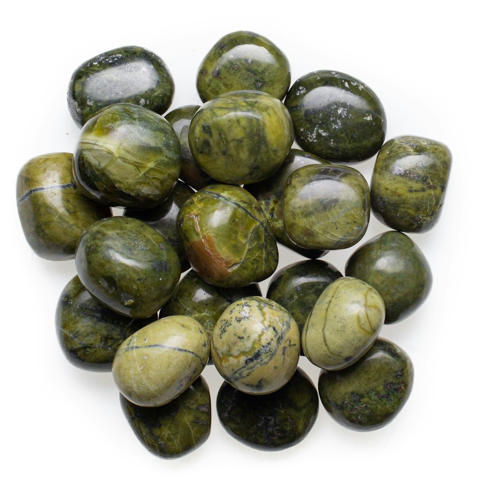 green and black round fruits