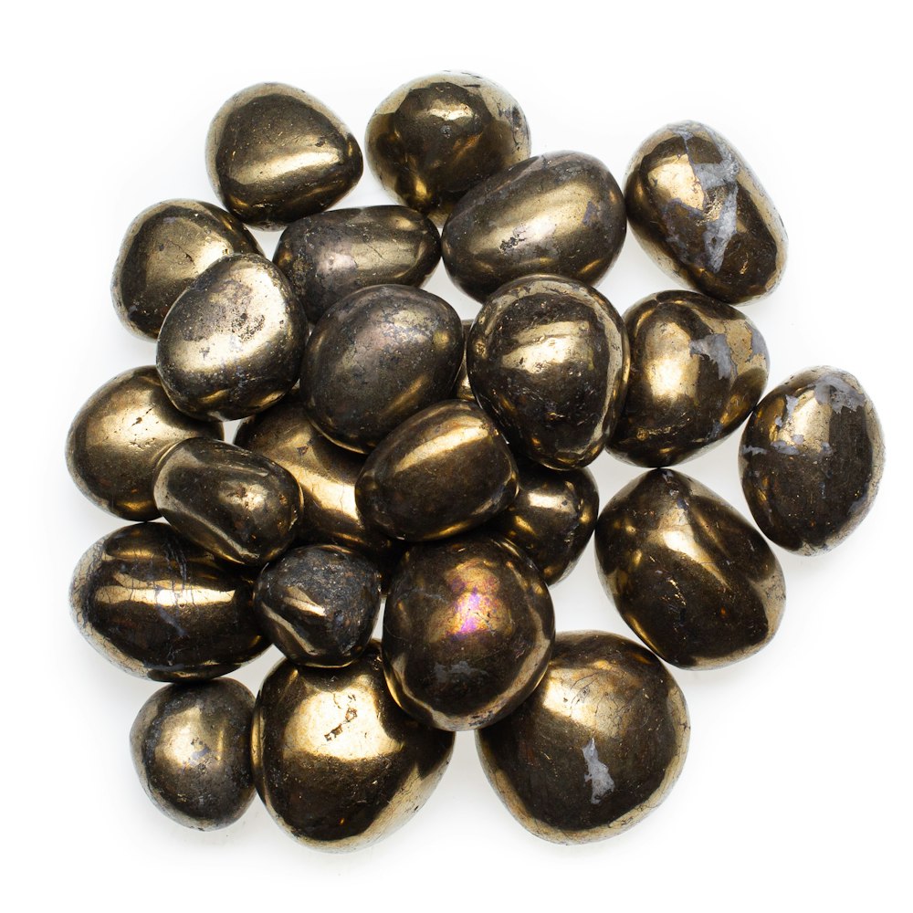 black round fruits on white surface