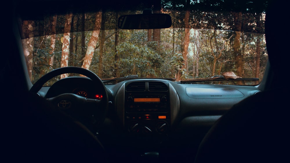 black car dashboard with black and orange car dashboard