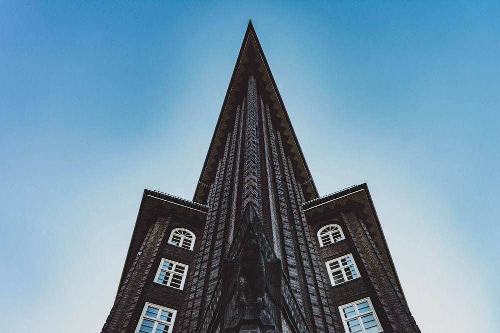 black and white concrete building under blue sky during daytime