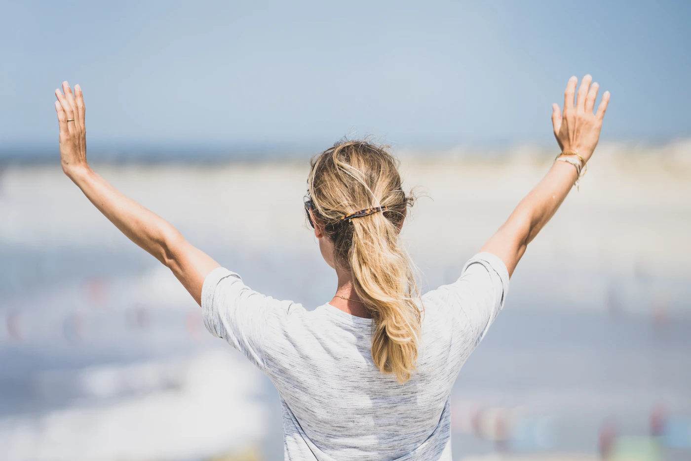 A woman in midlife, calm and confident, representing the women Holistic Harmony Wellness supports