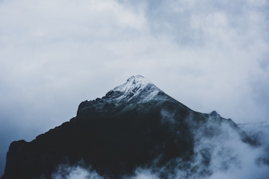 snow covered mountain under cloudy sky during daytime in Schafberg Switzerland