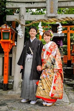 woman in kimono standing beside woman in kimono