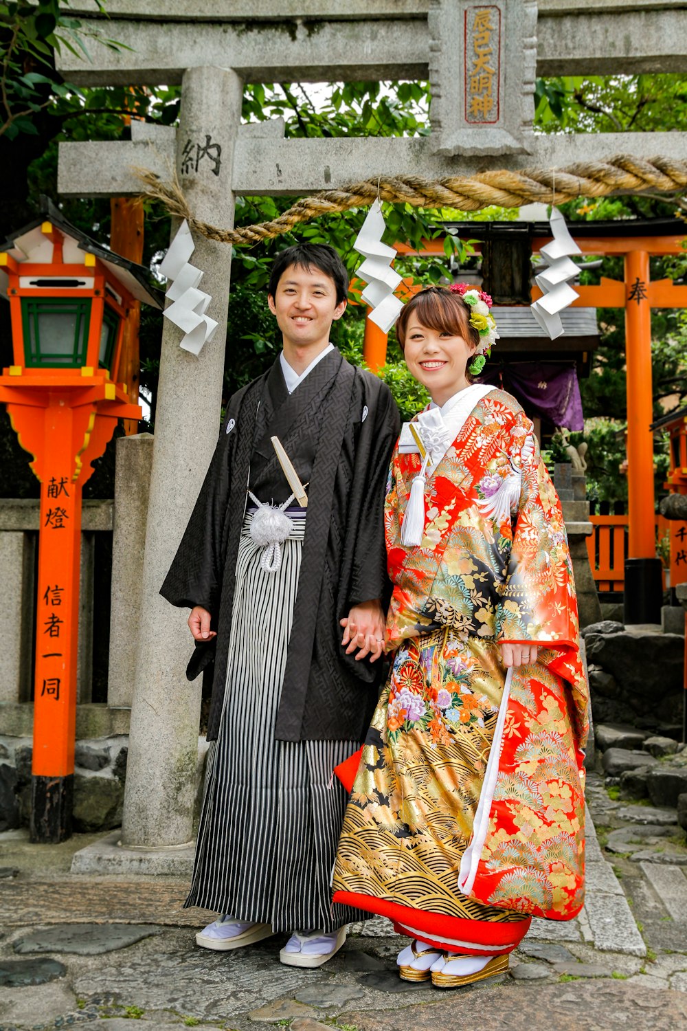 woman in kimono standing beside woman in kimono