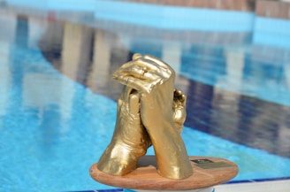 gold statue of a man