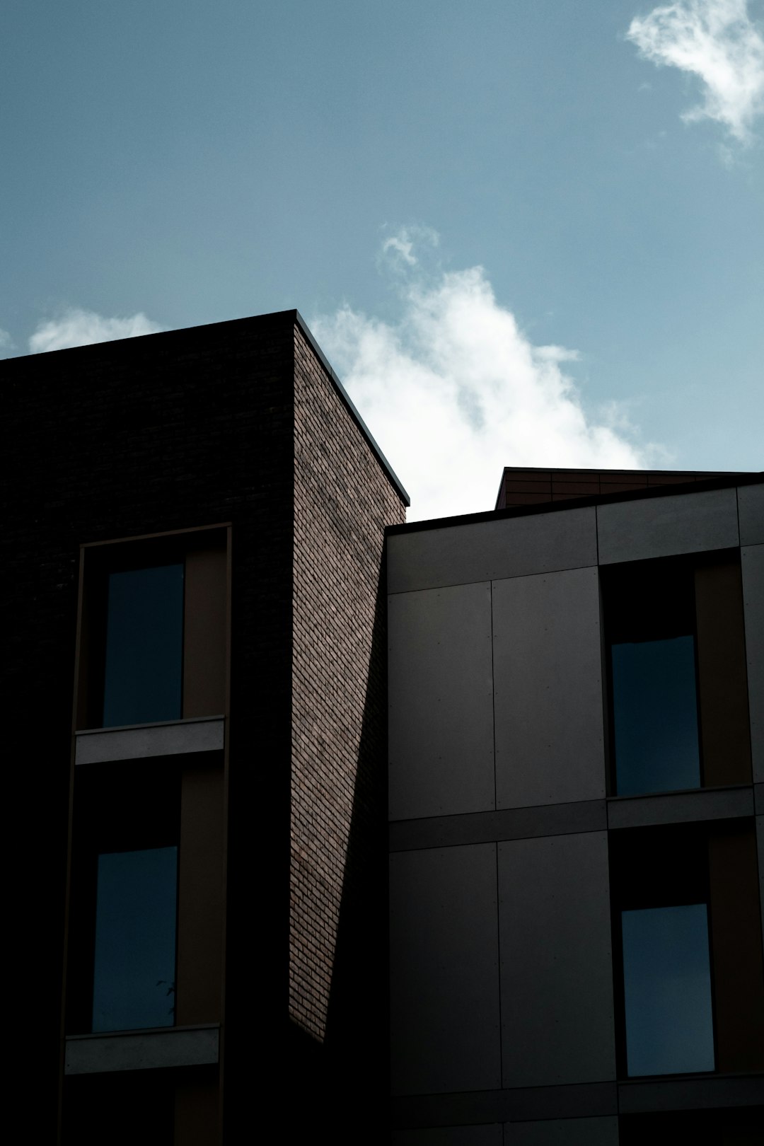 brown concrete building under blue sky during daytime