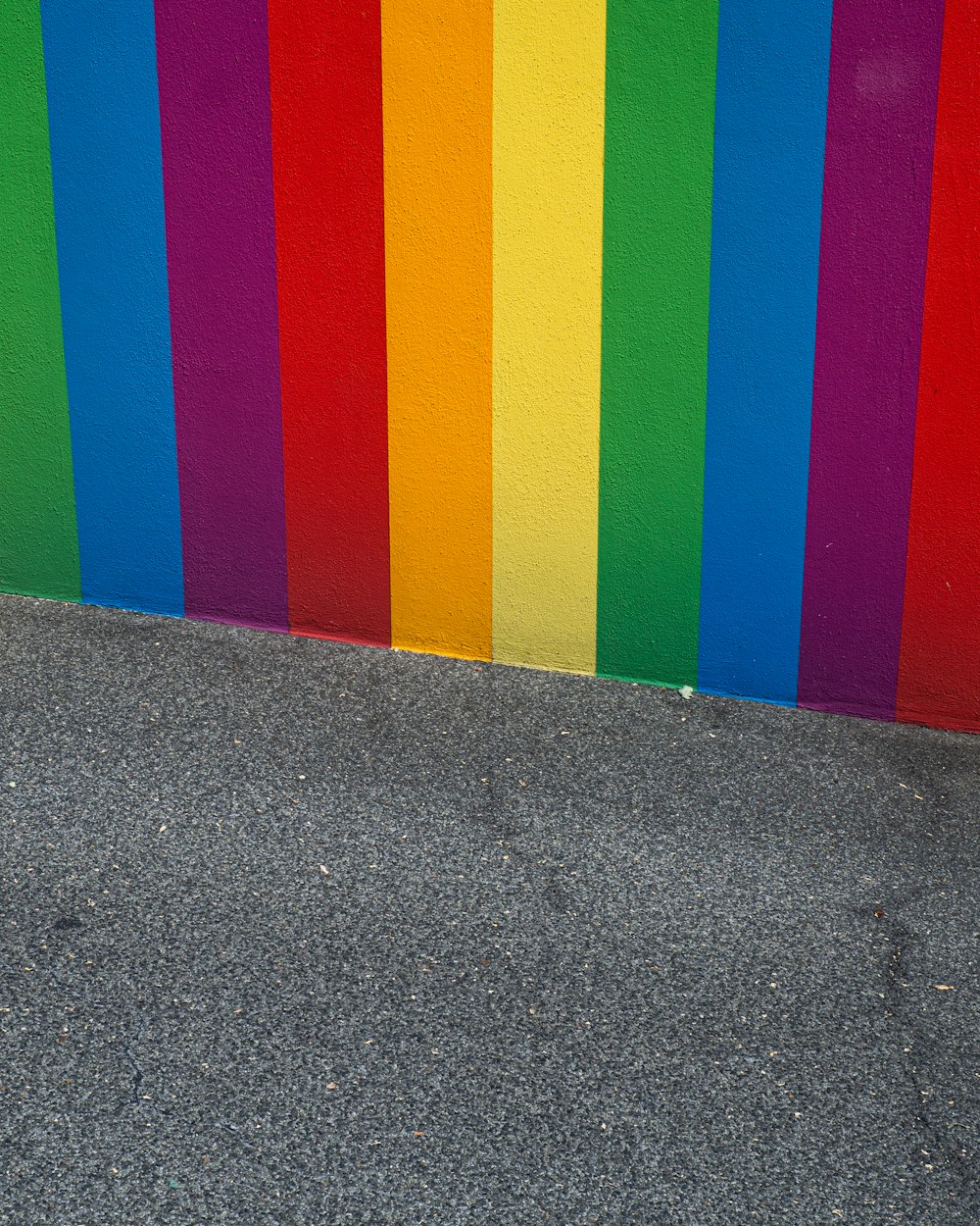 purple green and yellow striped wall